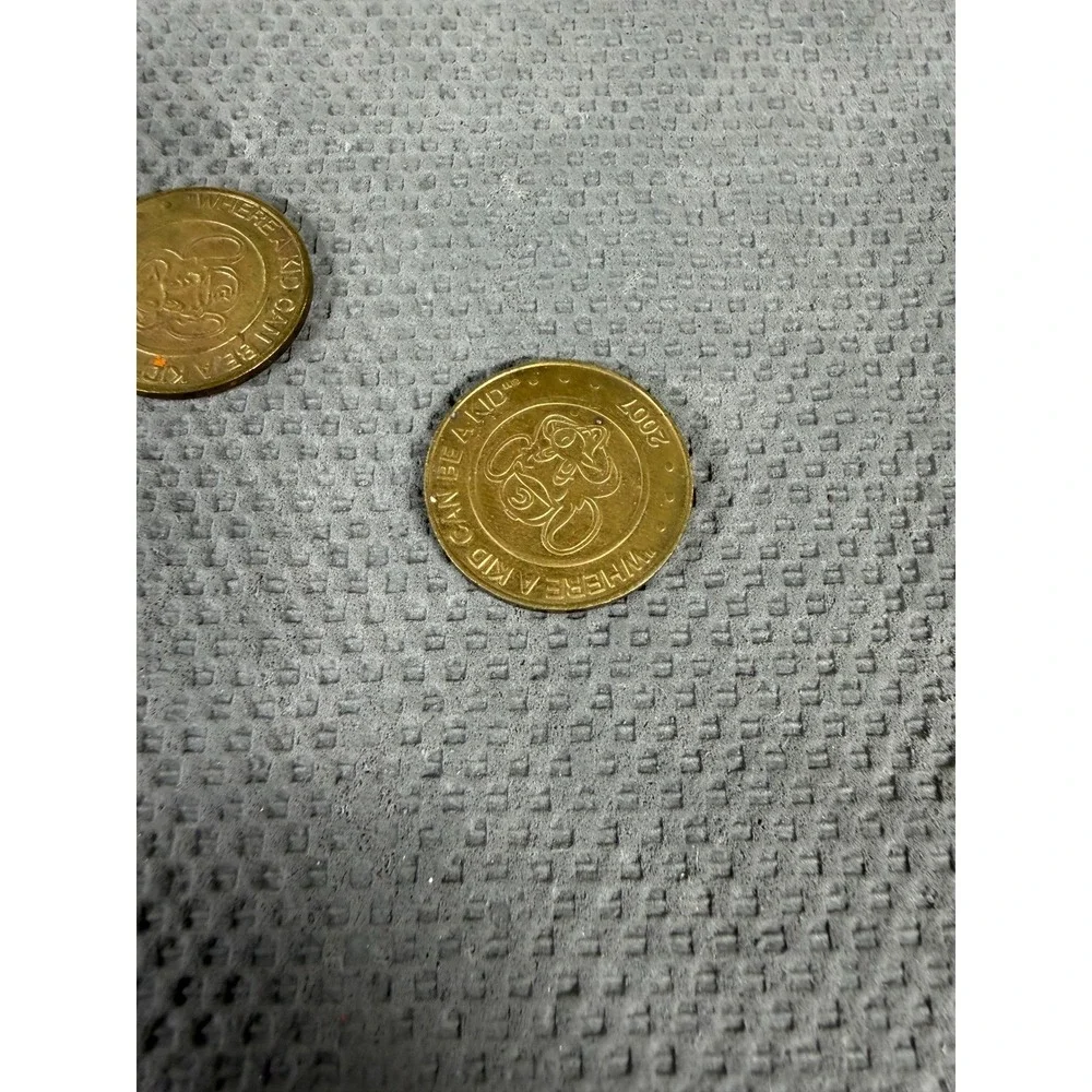 Chuck E. Cheese Game Tokens Lot of 2 Vintage 2004 2007 Collectible Arcade Coins
